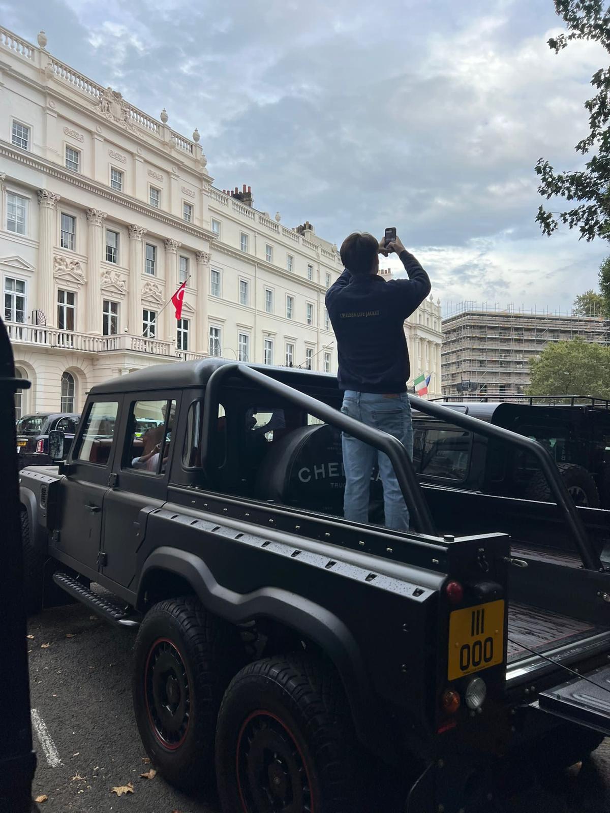 Toby filming from a vehicle in London